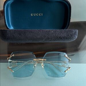 Gucci Women's Sunglasses with Blue bevel cut Lenses & Gold Details
